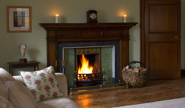 Relax in front of an open fire at Glencoe House